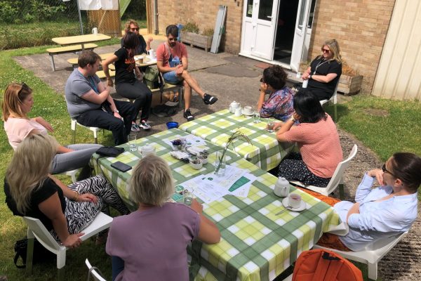 Staff in garden at Elmscroft Café