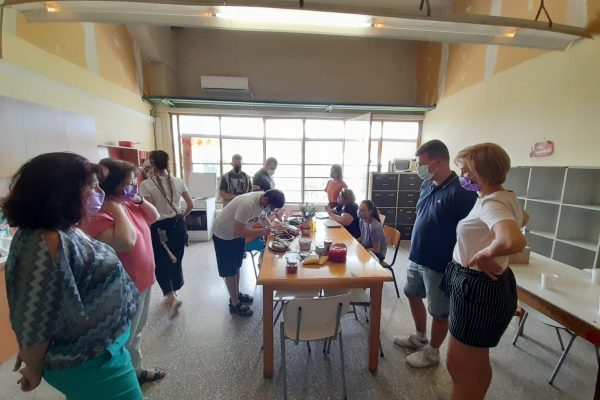 Staff observe food preparations