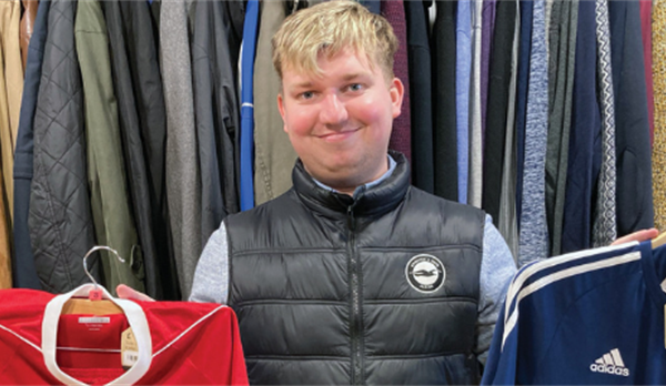 student working in Working in a charity store